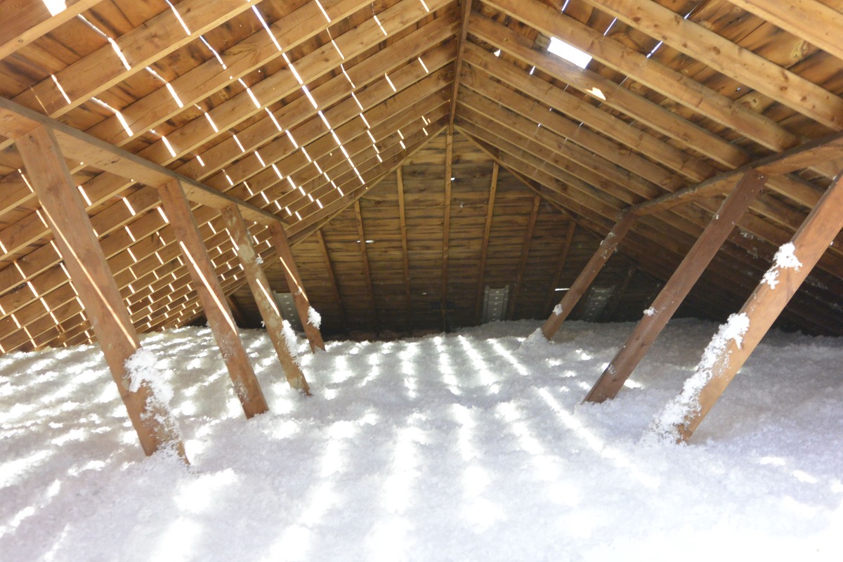 Attic with fresh blown-in insulation installed across the full floor.
